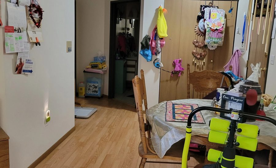 After: the same room with the floor cleared and a walking path through to the door