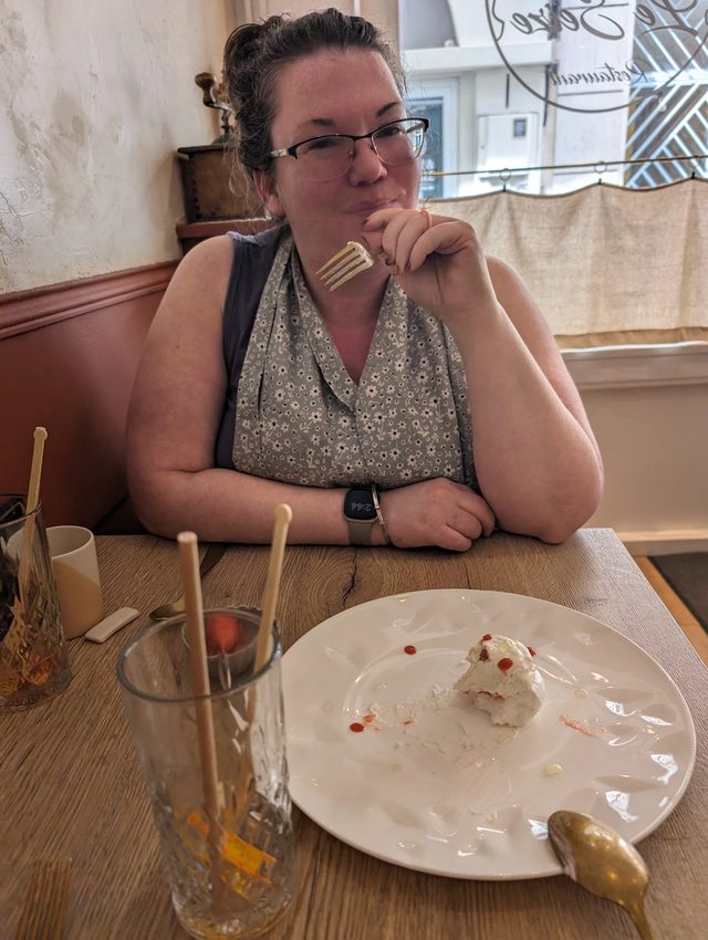 Tiffany Cosmano, professional organizer, smiling at a restaurant table